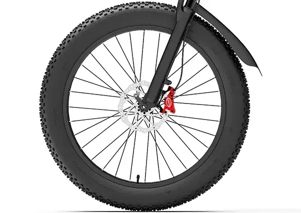 Pneumatico tassellato da 26x4.0 della Gogobest GF600 Plus, su terreno sterrato, con telaio arancione.